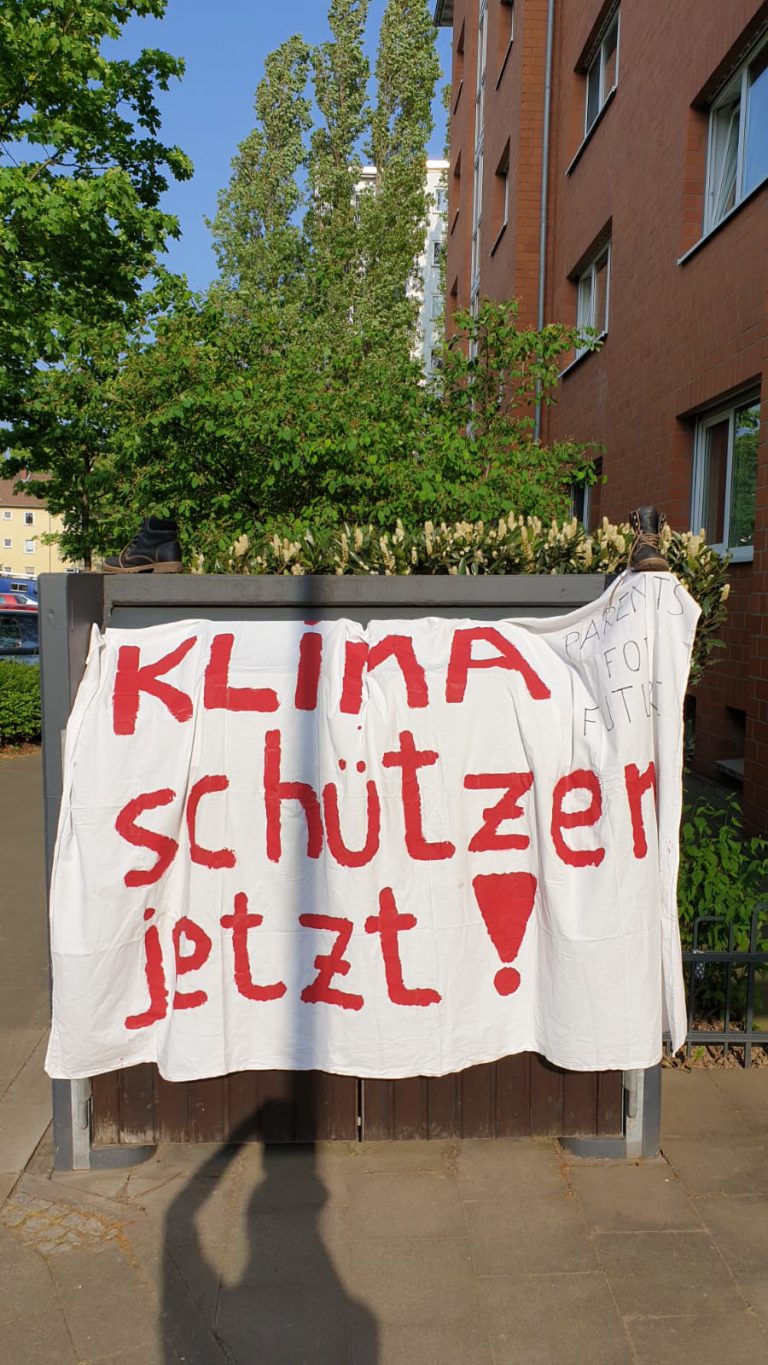Banner Klimaschützen jetzt an einem Gartenzaun