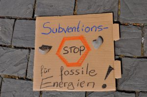 Demoplakat Subventionsstop für fossile Energien
